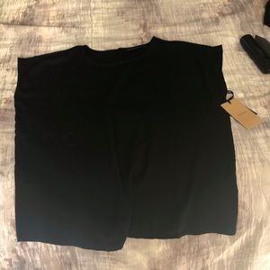 Black crepe like blouse.